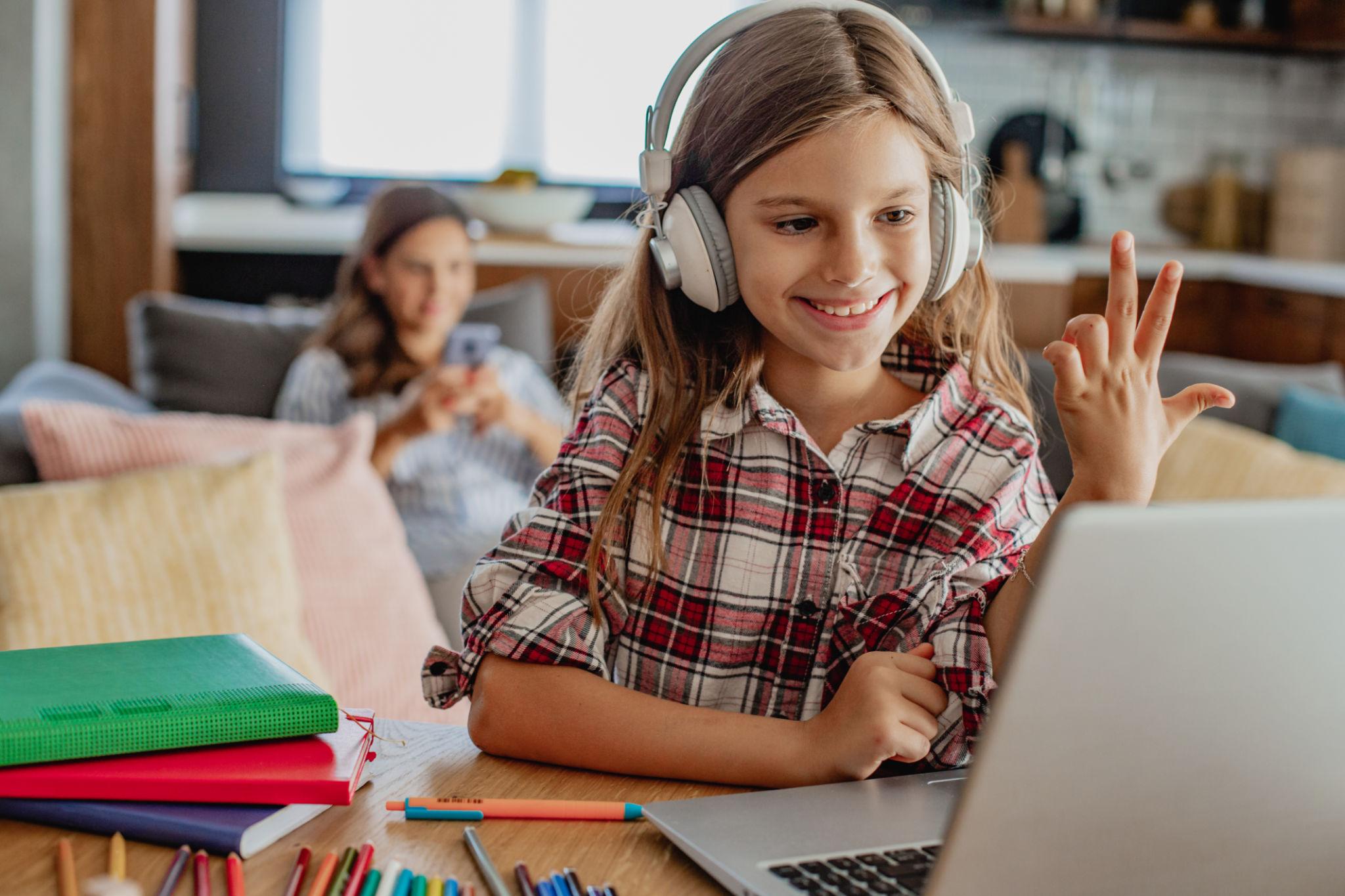 Student participating in live online instruction